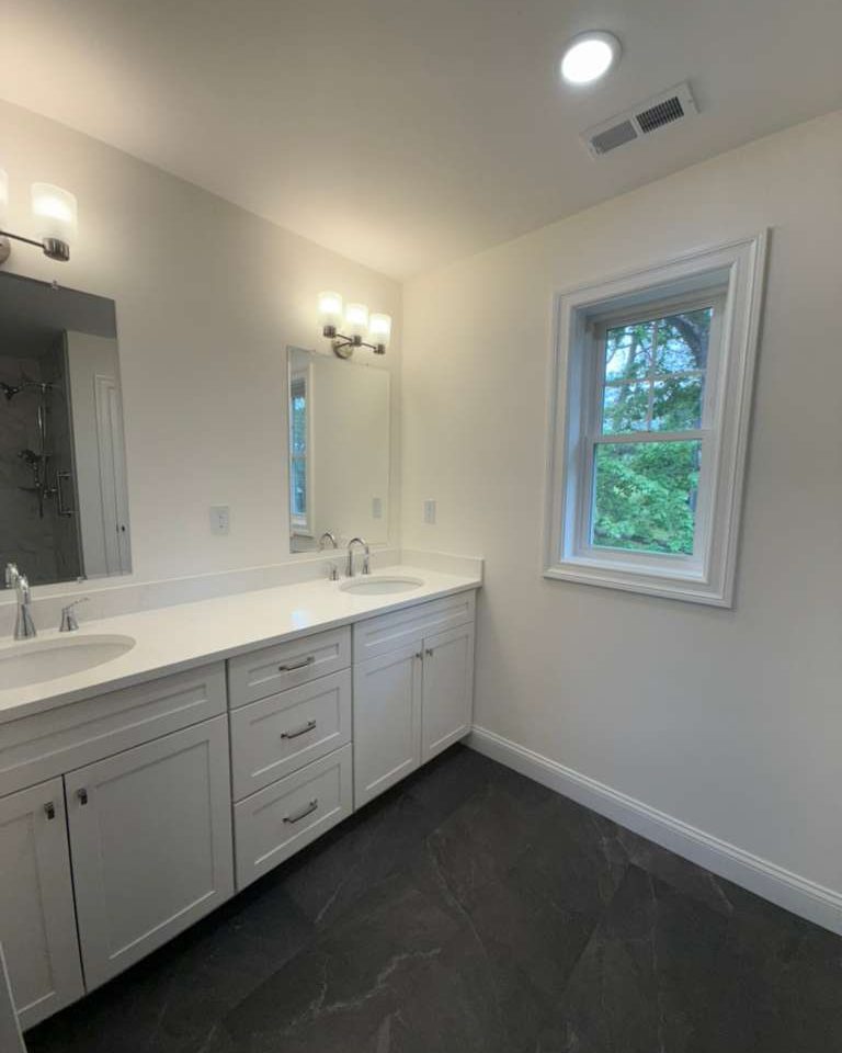 Bathroom vanity and glass cleaned to a finished standard